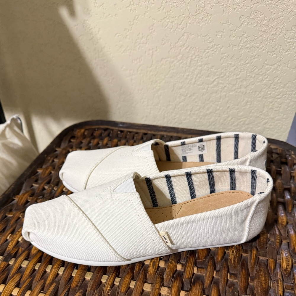 TOMS Ivory Canvas Slip-Ons